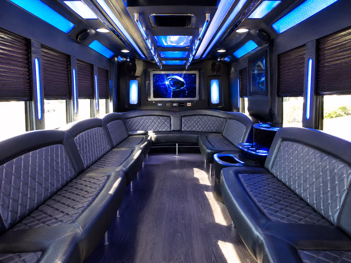 Passenger watching the Jersey City scenery during a regional party bus road trip